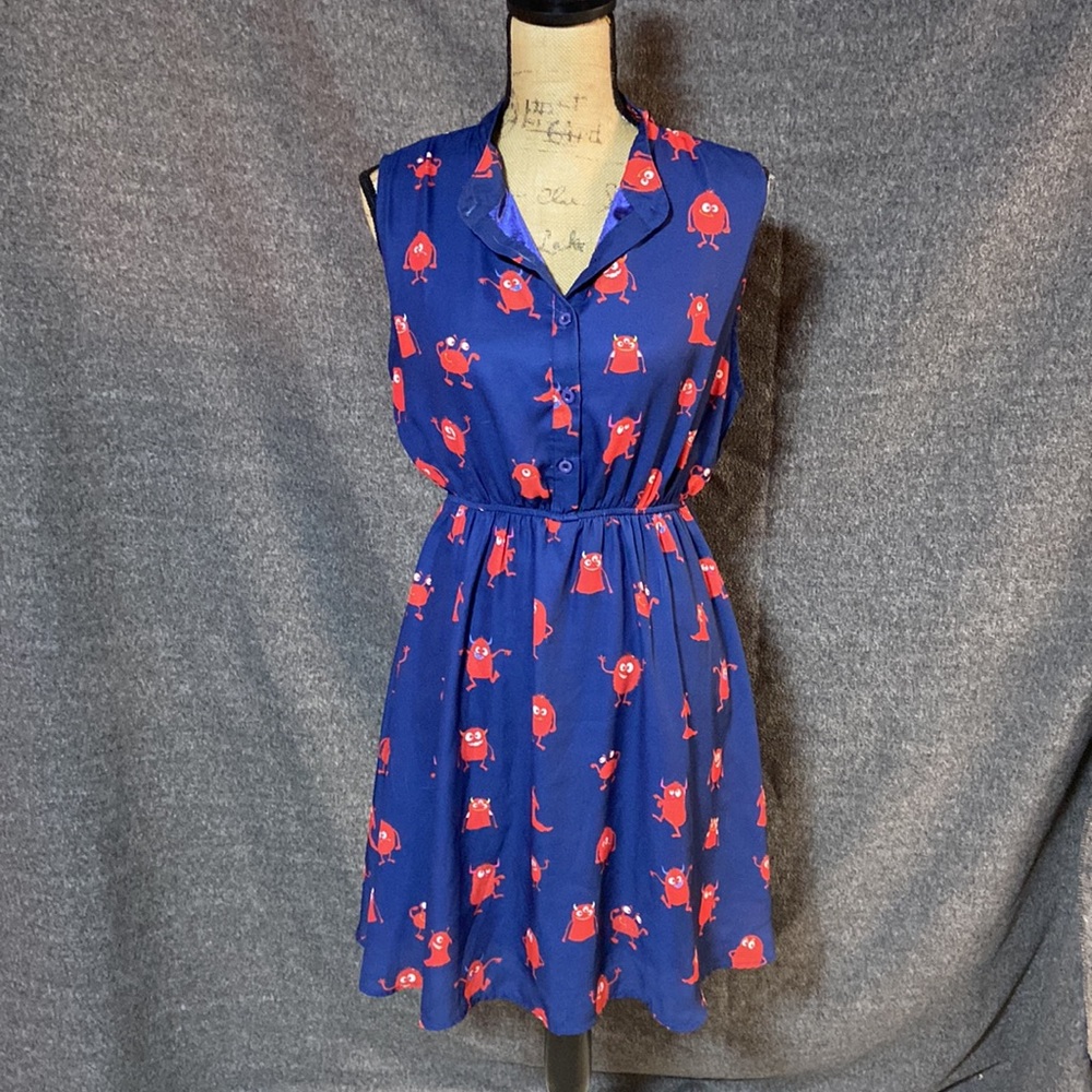 Navy Blue Sleeveless Dress with Red Pattern